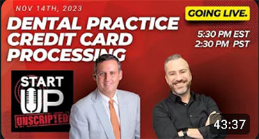 The image shows a promotional graphic with two men standing on either side of a banner advertising a dental practice credit card processing event. One man is wearing a blue suit, and the other is dressed in a more casual style. The background includes a red advertisement banner with text and logos, and there s a date and time for the event.