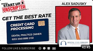 The image shows a billboard advertisement with a man standing on the right side, wearing a suit and tie, smiling at the camera. He appears to be a professional, possibly a businessman or a public figure. On the left side of the billboard, there s an illustration of a credit card with the text Get the Best Rate above it. The credit card has a logo that reads Dental Practice Owner. Below the illustration, there is a phone number and a website URL. The background features a brick wall texture and the top left corner of the billboard displays an emblem with the words STARTUP UNSCRIPTED and a logo that seems to be related to a podcast or media platform. The overall style of the image suggests it s an advertisement for a dental practice, possibly offering special rates or services.